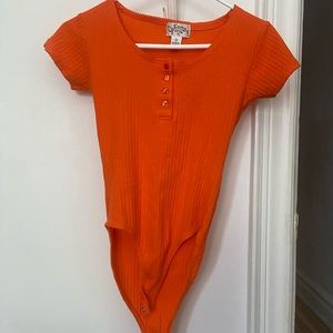 Orange body suit